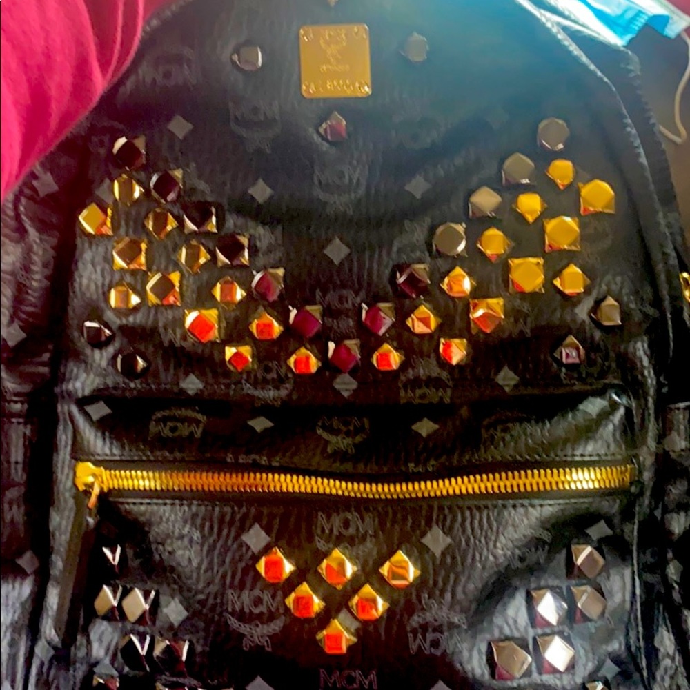 MCM MUNCHEN Black and Gold studded backpack
